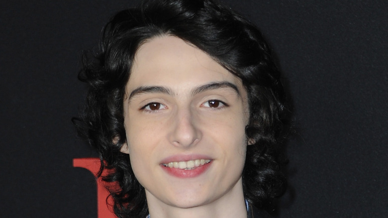 Finn Wolfhard smiling