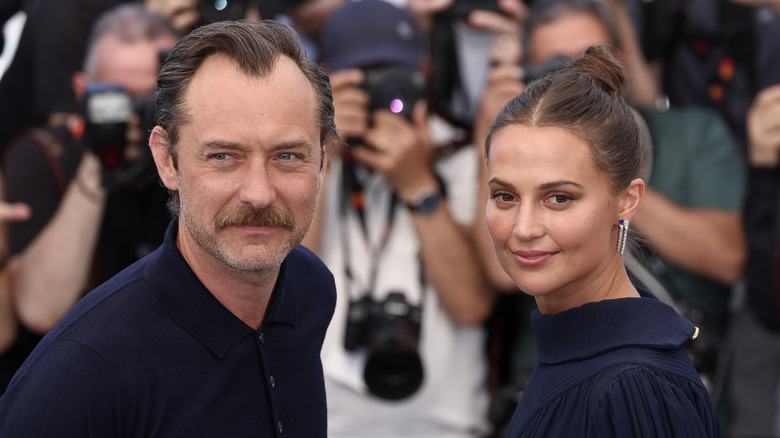 Jude Law and Alicia Vikander looking forward
