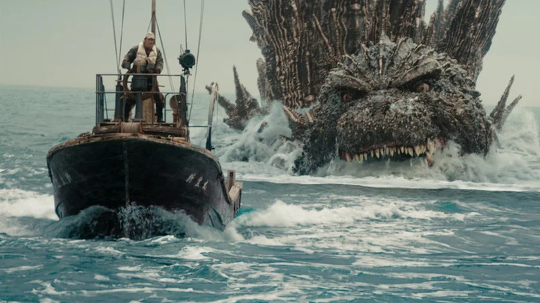 Godzilla swimming toward boat in Godzilla Minus One