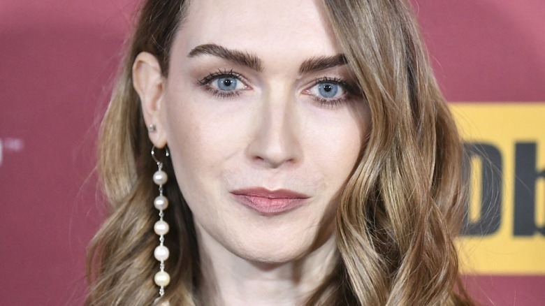 Jamie Clayton long earring