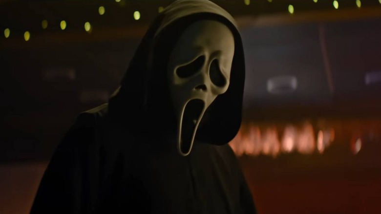 Ghostface standing in a bar in Scream 7