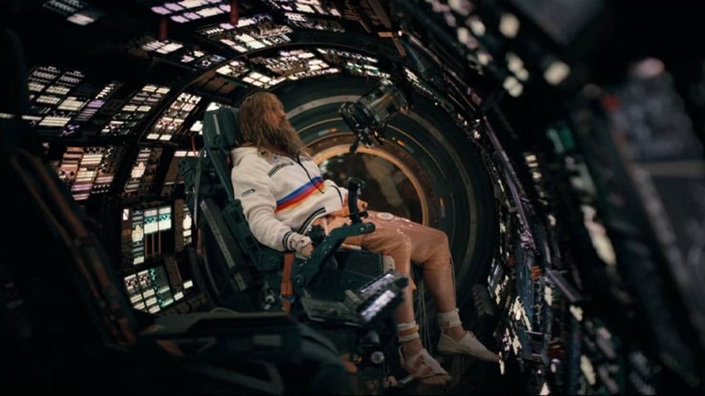 Ryland floating in his spaceship with long hair and a beard in Project Hail Mary