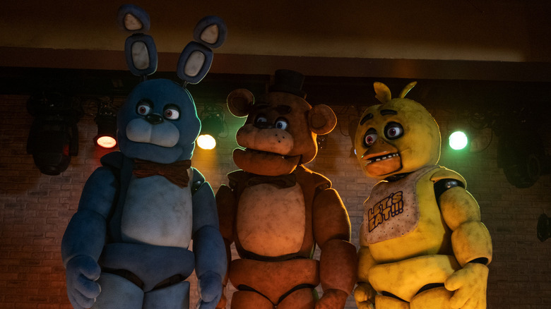 Freddy and animatronics staring