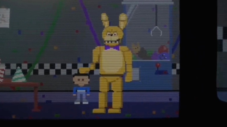 Golden Bonnie patting child's head