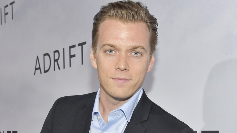 Jake Abel smiling