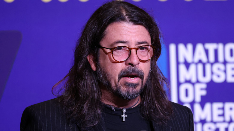 Dave Grohl speaks from a podium