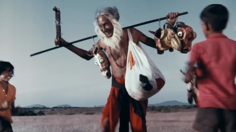 Children dancing around Kummatty in Kummatty