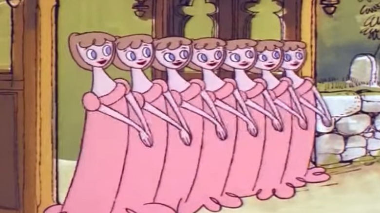 Seven identical young women standing side by side in Ruddigore