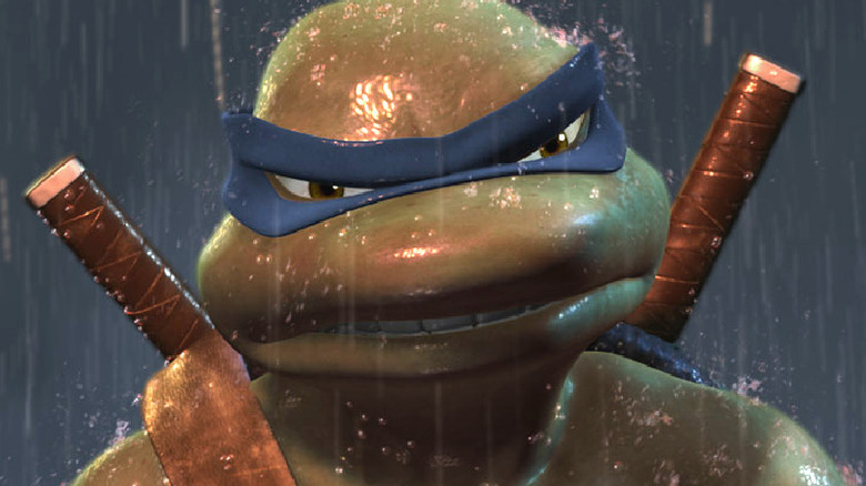 Leonardo stands in the rain in 