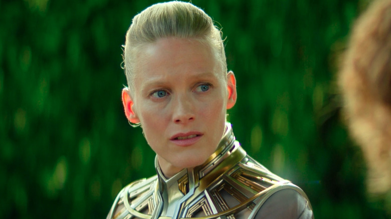 Demerzel (Laura Birn) talks with an anonymous Zephyr in a garden in 