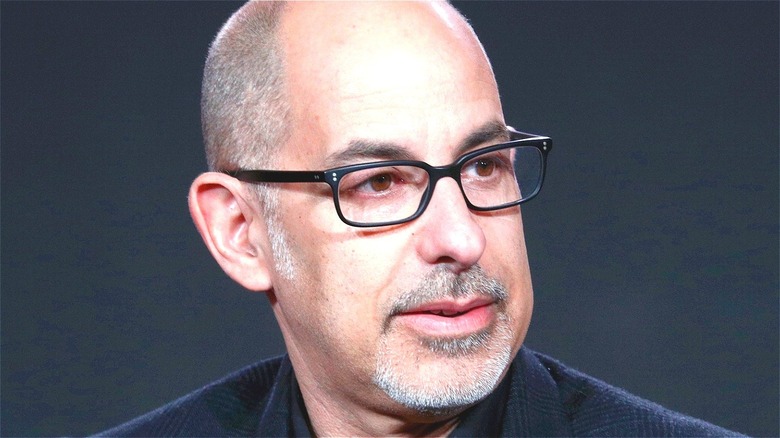 David S. Goyer wearing glasses