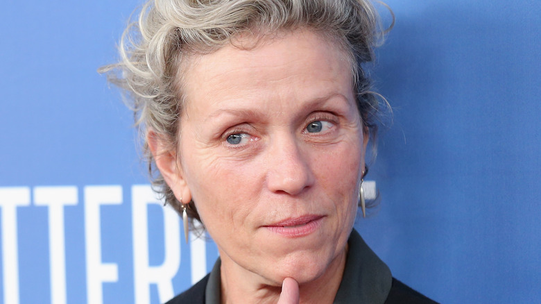 Frances McDormand with finger on chin