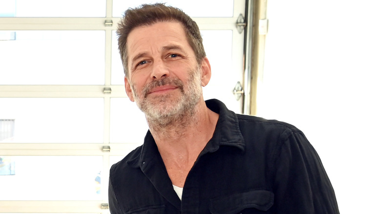 Zack Snyder posing for a photo