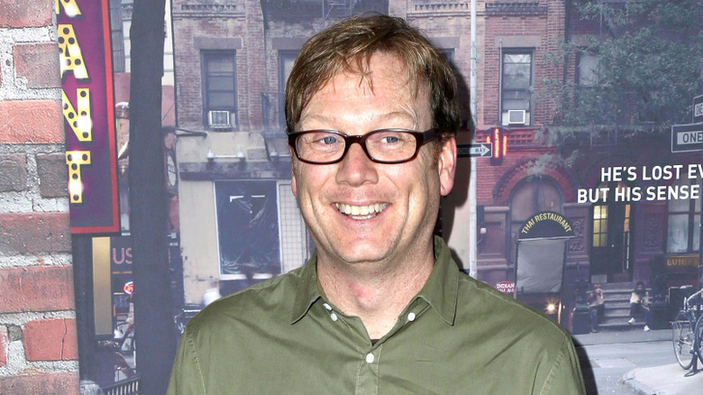 Andy Daly green shirt grinning