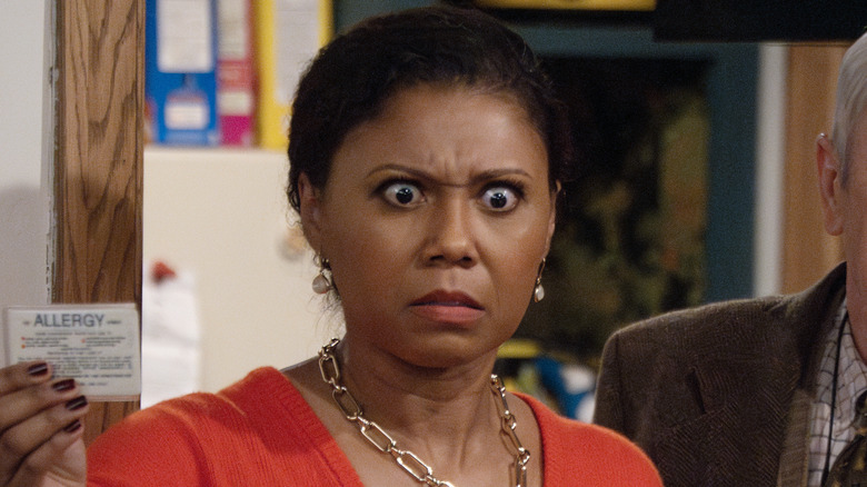 Olivia Laughing in Bar