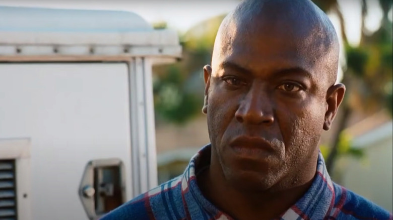 Tiny Lister Jr. grimacing