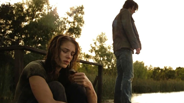 Whitney Miller looking at a locket in Friday the 13th (2009)