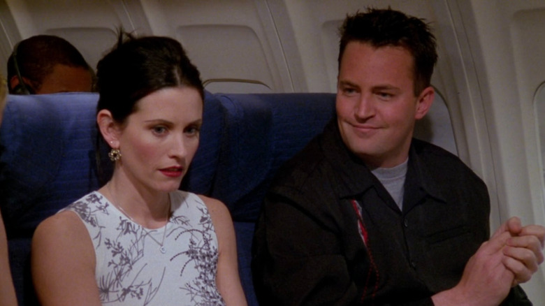 Chandler and Monica on flight