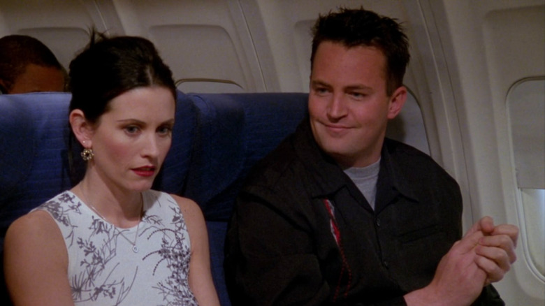 Chandler and Monica on flight