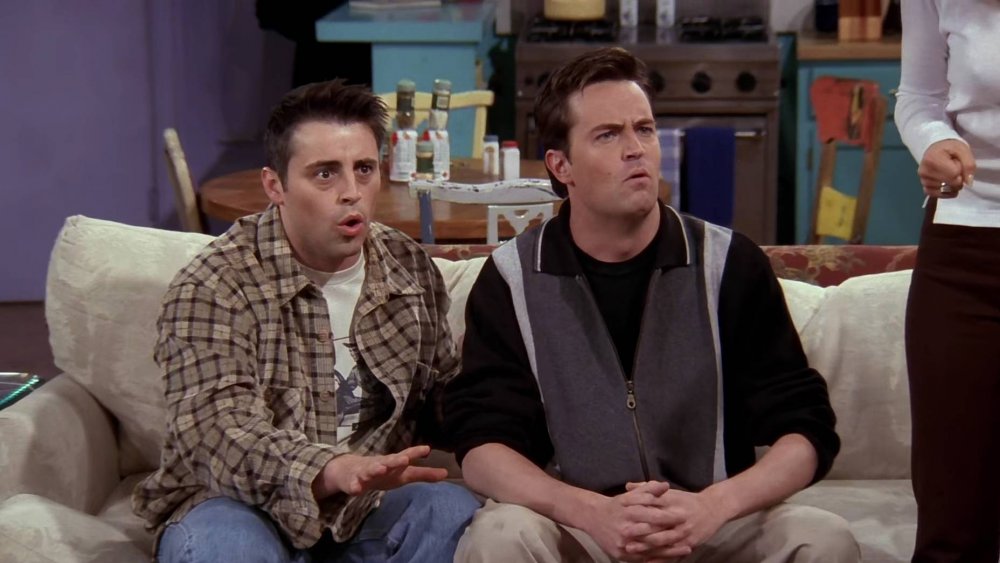 Chandler (Matthew Perry) and Joey (Matt LeBlanc) play a trivia game on Friends