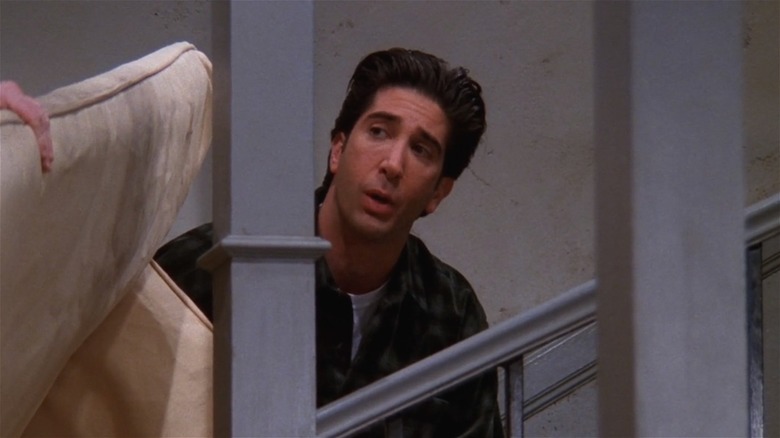 Ross standing in stairwell