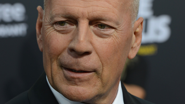 Bruce Willis getting interviewed