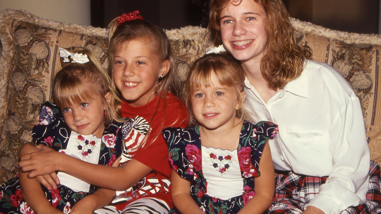 Tanner Sisters on couch