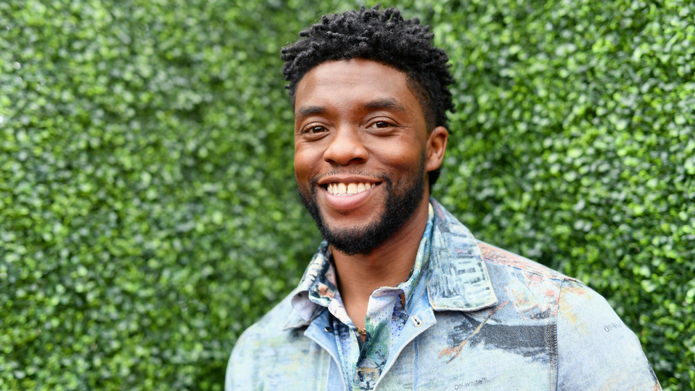 A photo of Chadwick Boseman smiling 