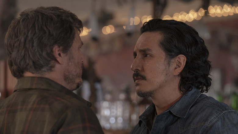 Tommy stares intensely at Joel