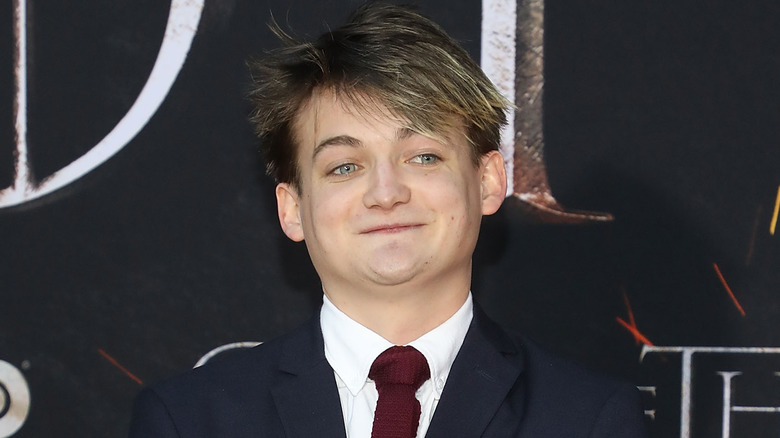 Jack Gleeson smirking