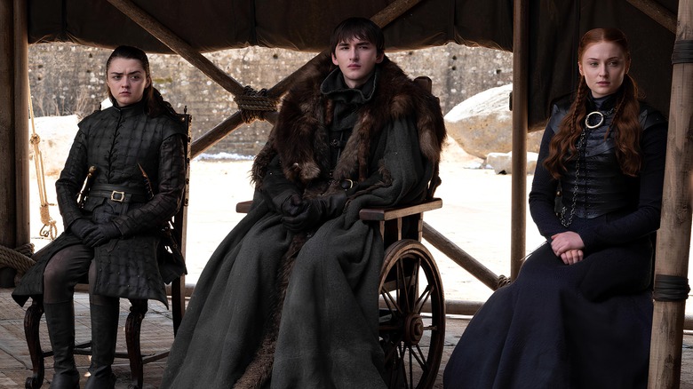 Arya, Bran, and Sansa watching