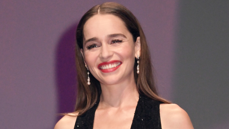 Emilia Clarke smiling at an event