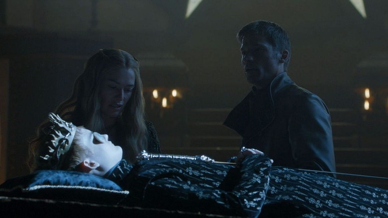 Joffrey's body laying in front of Cersei and Jaime on Game of Thrones