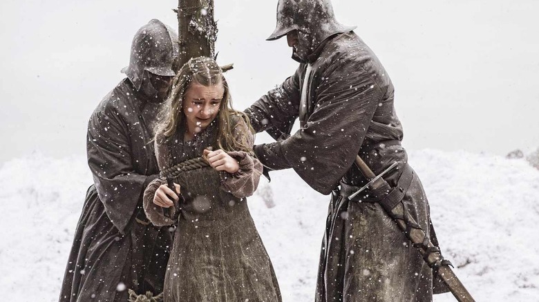 Shireen being tied to a stake in Game of Thrones