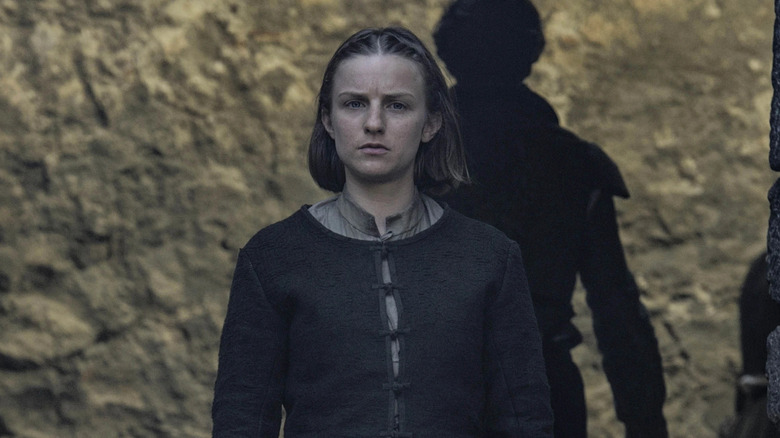The Waif standing staring