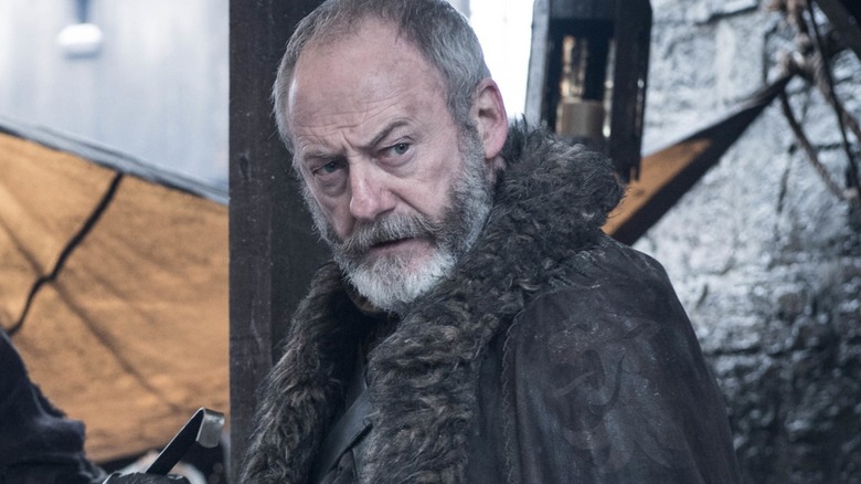 Davos Seaworth looks over shoulder