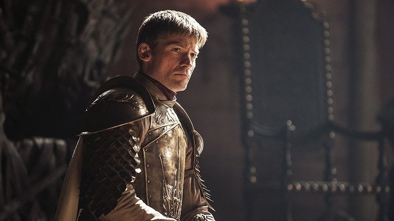 Jaime standing in front of Iron Throne looking concerned on Game of Thrones