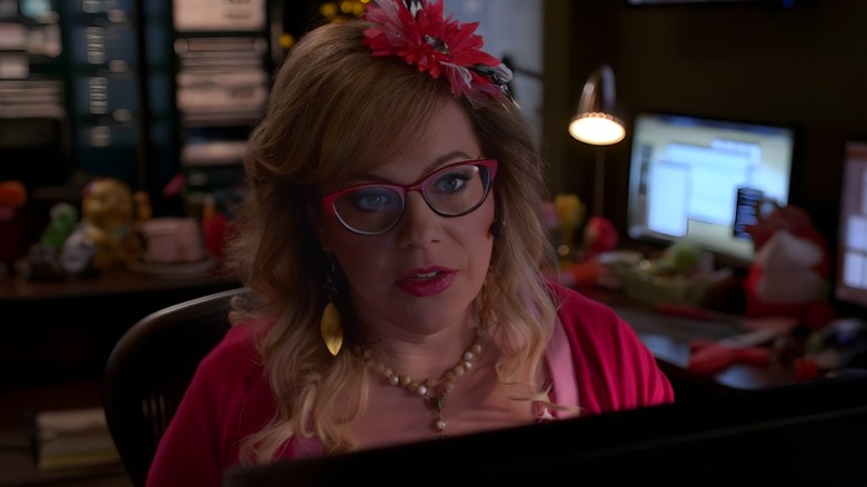 Penelope Garcia flower in hair