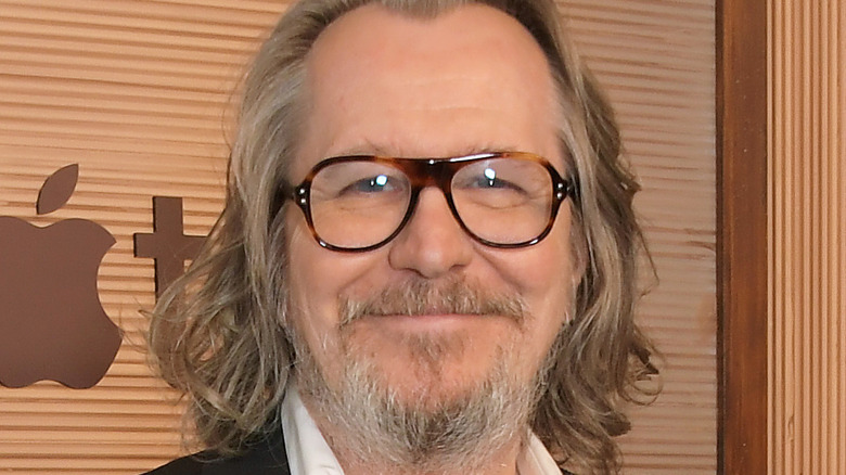 Gary Oldman smiling at the premiere of "Slow Horses"