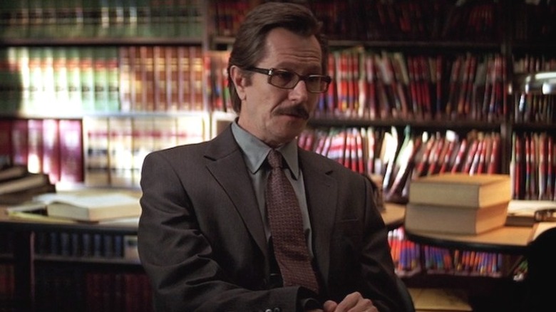 Commissioner Gordon sitting in a chair