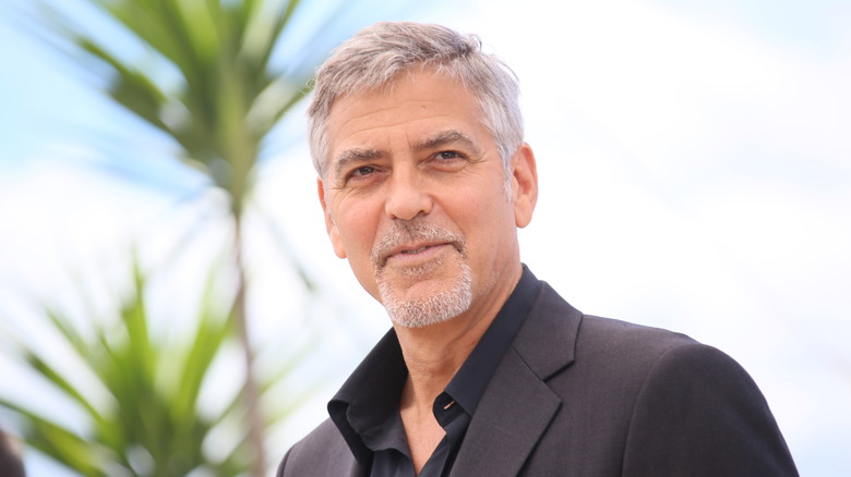 George Clooney smiling outside