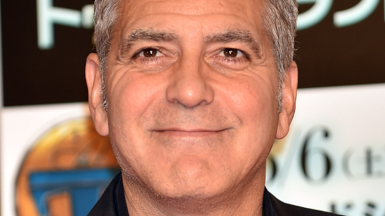 George Clooney smirks