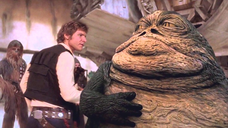 Han Solo speaking with Jabba the Hutt in "Star Wars" (1977)