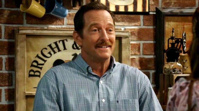 Joseph smiling in "Georgie and Mandy's First Marriage"