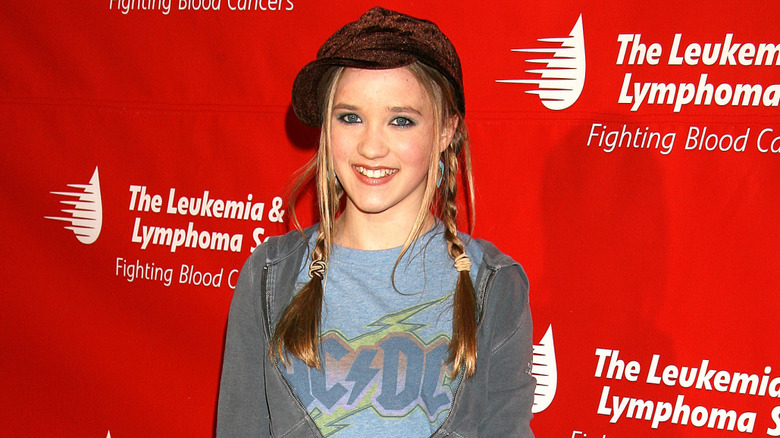 Emily Osment smiling at the 2nd Annual Celebrity Rock'N Bowl in Hollywood