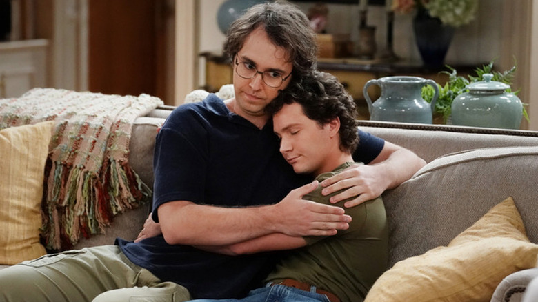 Connor McAllister hugging Georgie Cooper