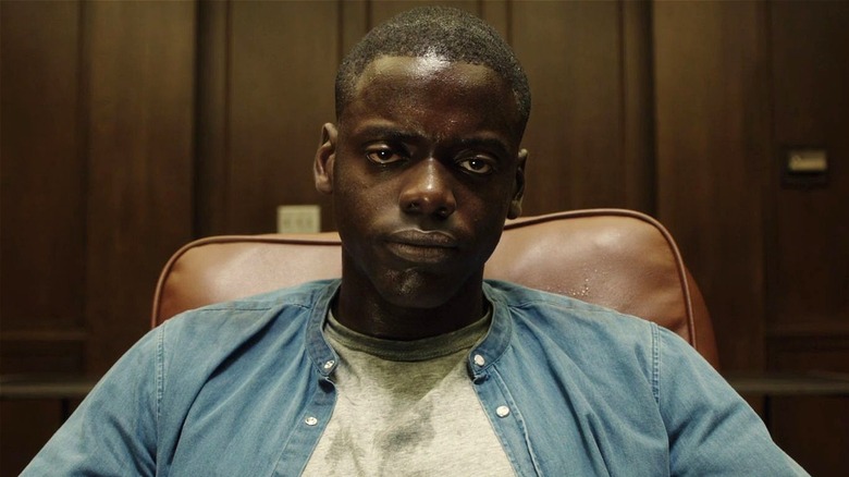 Chris sitting down in basement at the end of Get Out