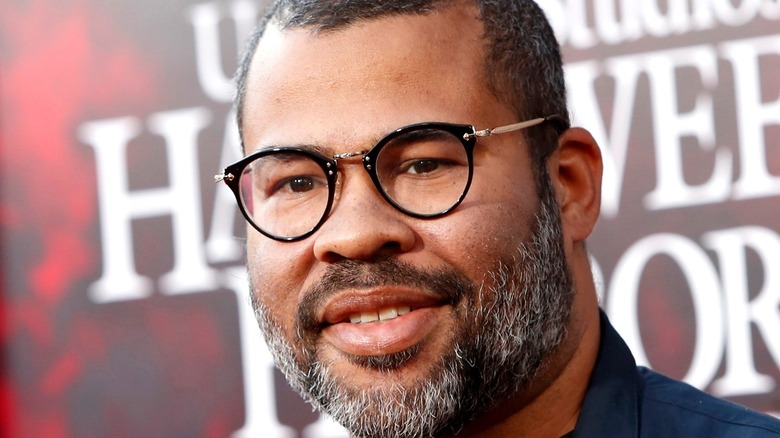 Jordan Peele smiling at event