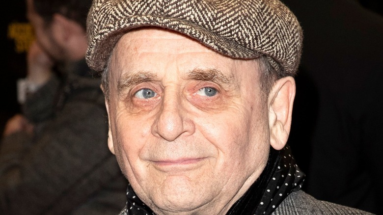 Sylvester McCoy on red carpet