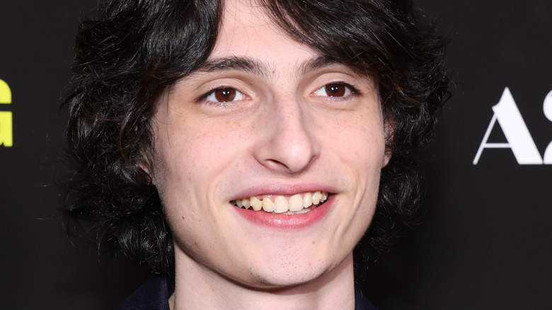 Finn Wolfhard smiling